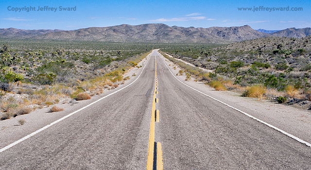 Road in Mojave Desert Simplicity Photograph by Jeffrey Sward