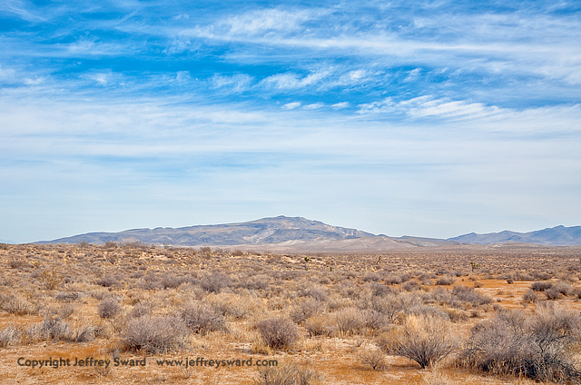 Red Rock Canyon State Park Approach through Mojave Desert Simplicity Photograph by Jeffrey Sward