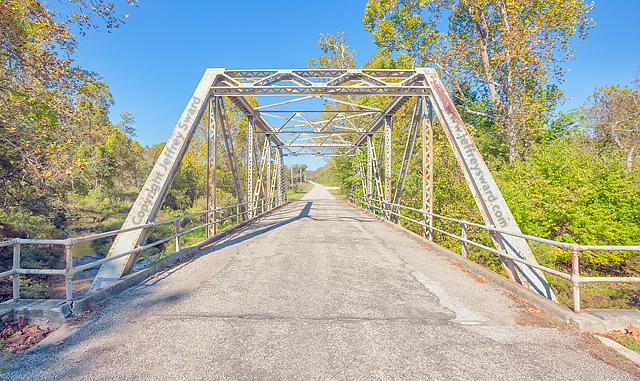 Picturesque 1926 thru-truss bridge over Johnson Creek West of Paris Springs Missouri on farm road 2062 near Missouri Historic Route 66 Simplicity Photograph by Jeffrey Sward